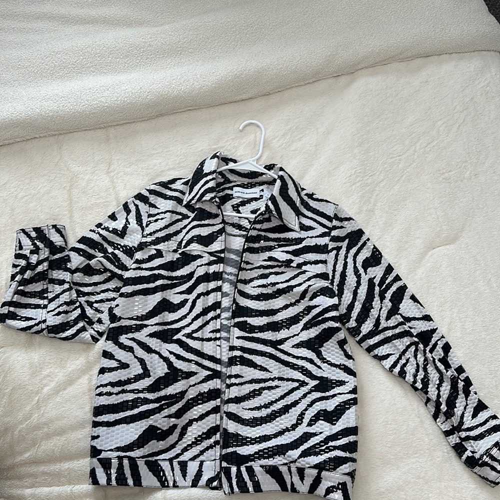 Zebra jacket size 10 fits like a medium